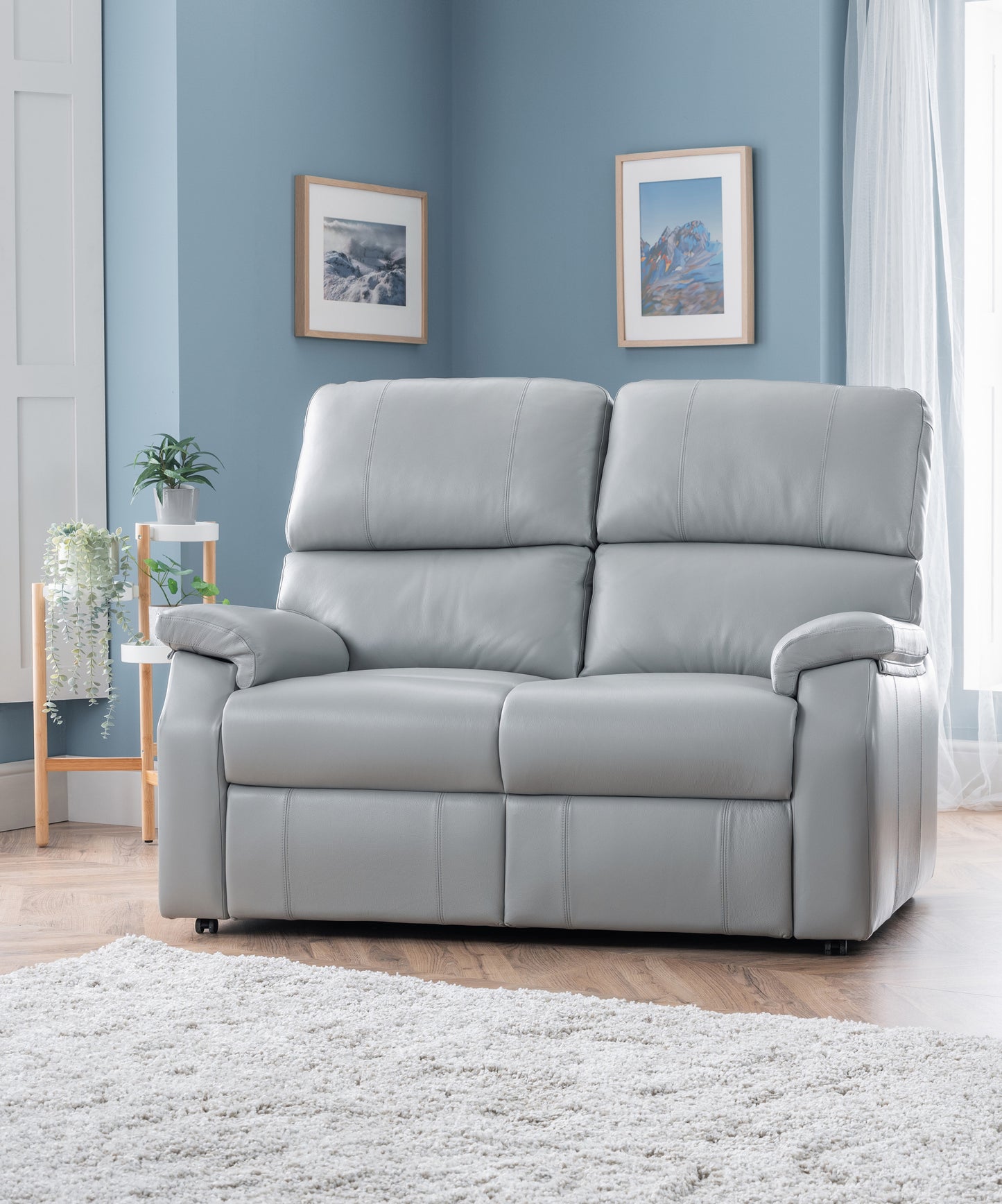 Celebrity Newstead Two Seater Electric Powered Reclining Leather Sofa With Lumbar & Headrest Adjustment Option