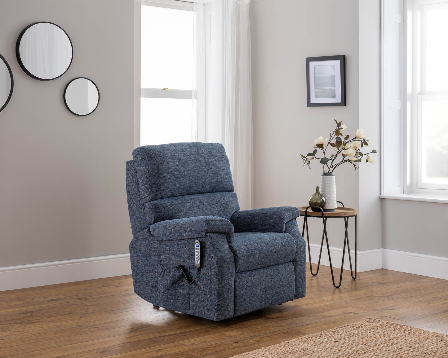 Celebrity Newstead Electric Powered Recliner Fabric Armchair With Adjustable Headrest & Lumbar Option