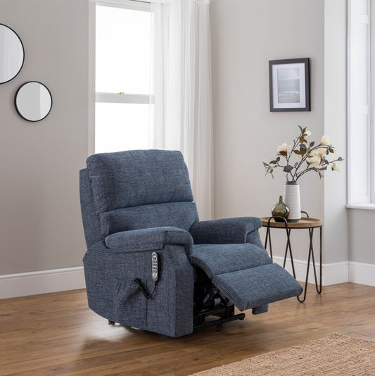 Blue celebrity newstead recliner chair in a room with a side table and decor