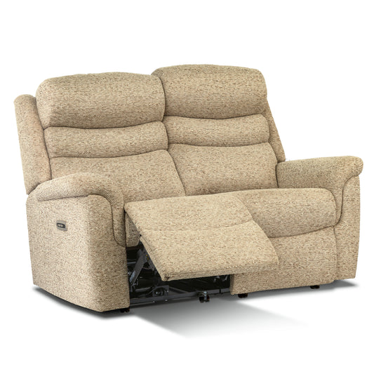 Beige recliner sofa on a white background