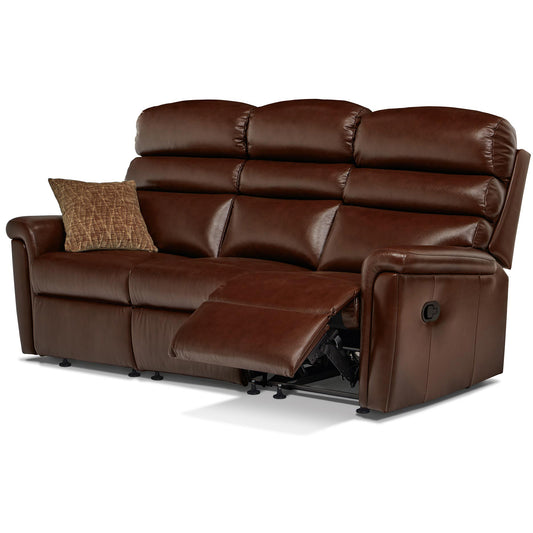 Brown leather Sherborne Comfi Sit reclining sofa with a pillow on a white background