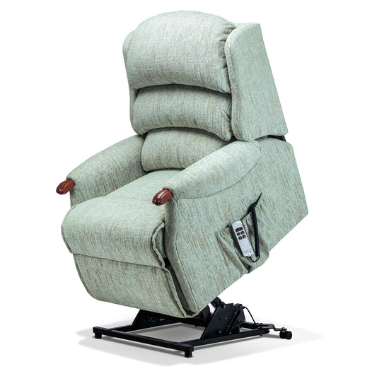 Light gray recliner chair with remote control on a white background