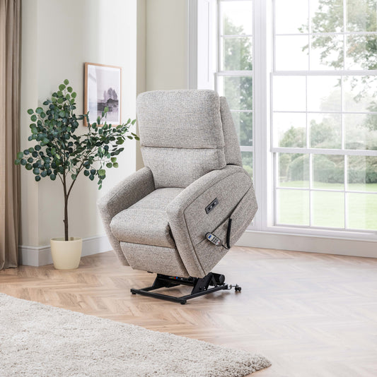 Gray Celebrity Southwell recliner chair in a room with a window and plant